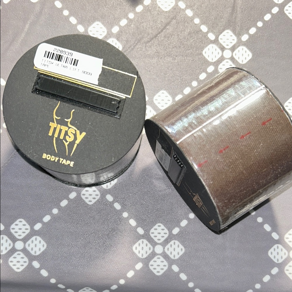AKIRA BODY TAPE. brown and black spools.
